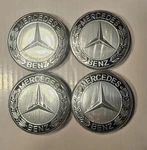 New Genuine Oem 98-25 Mercedes Benz Center Caps Set A1714000125 Laurel Wreath. Fixed Price $22.95.