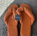 American Eagle Outfitters Orange Twisted Strap Slip On Flat Sandals Women's 9. Fixed Price $24.00.