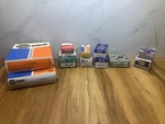 Lot Of 11 Auto Parts: Napa Echlin Fuel, Carb, Ignition, U-joint, Filter, Therost. Fixed Price $93.00.